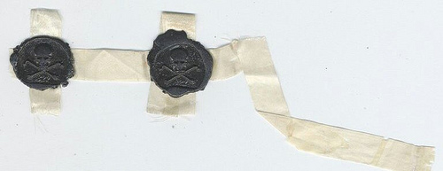 Skull and Bones wax seals circa 1865, showing skull over crossbones with 322